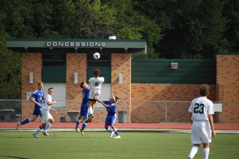 Malik Bryant jumps to head ball