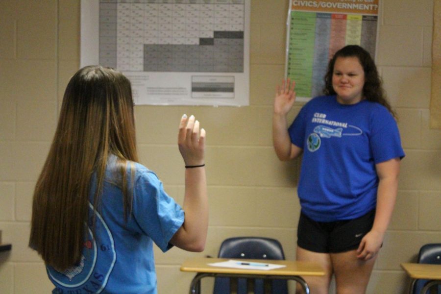 Katelynn Brammer swearing in Elizabeth Anderson in the court.