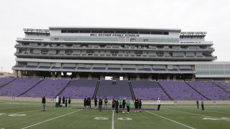 The team practices at the stadium before their game later that day.