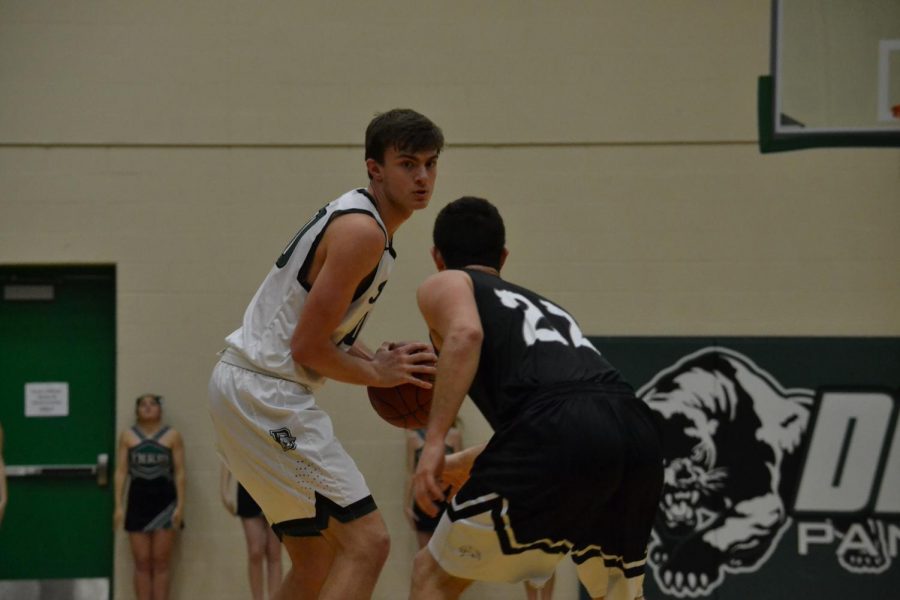 Derby boys finish fifth at McPherson basketball tournament
