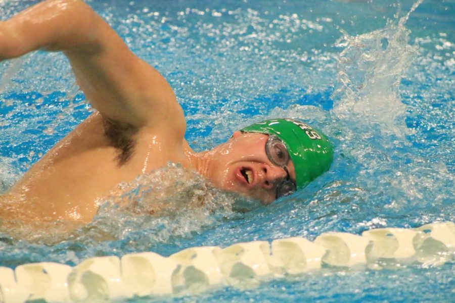 Senior+Caleb+Strohminger+leans+to+the+side+during+freestyle+for+a+breath+of+air.+