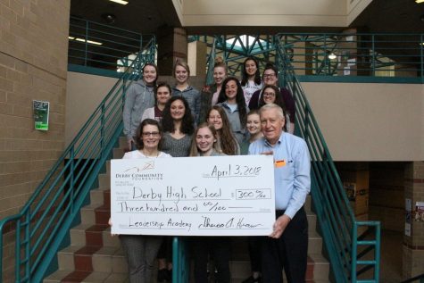 Chick-Fil-A Leadership Academy received a $300 check for the Run White Blue fundraiser
