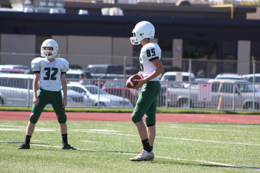  Freshman Drake Thatcher gets ready to punt the ball.
