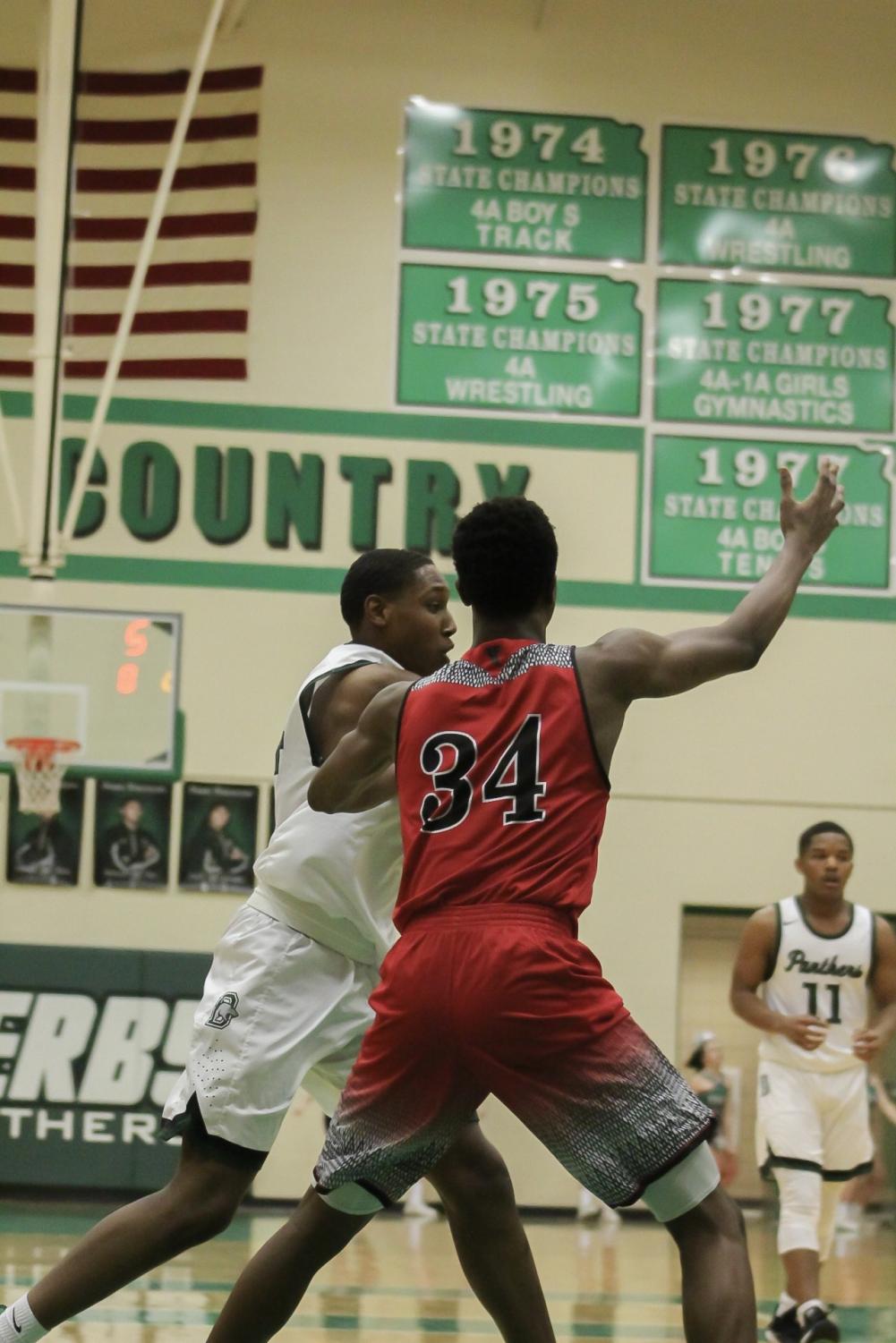 1%2F10+boys+basketball+vs.+Heights+photo+gallery+by+Grace+Reich