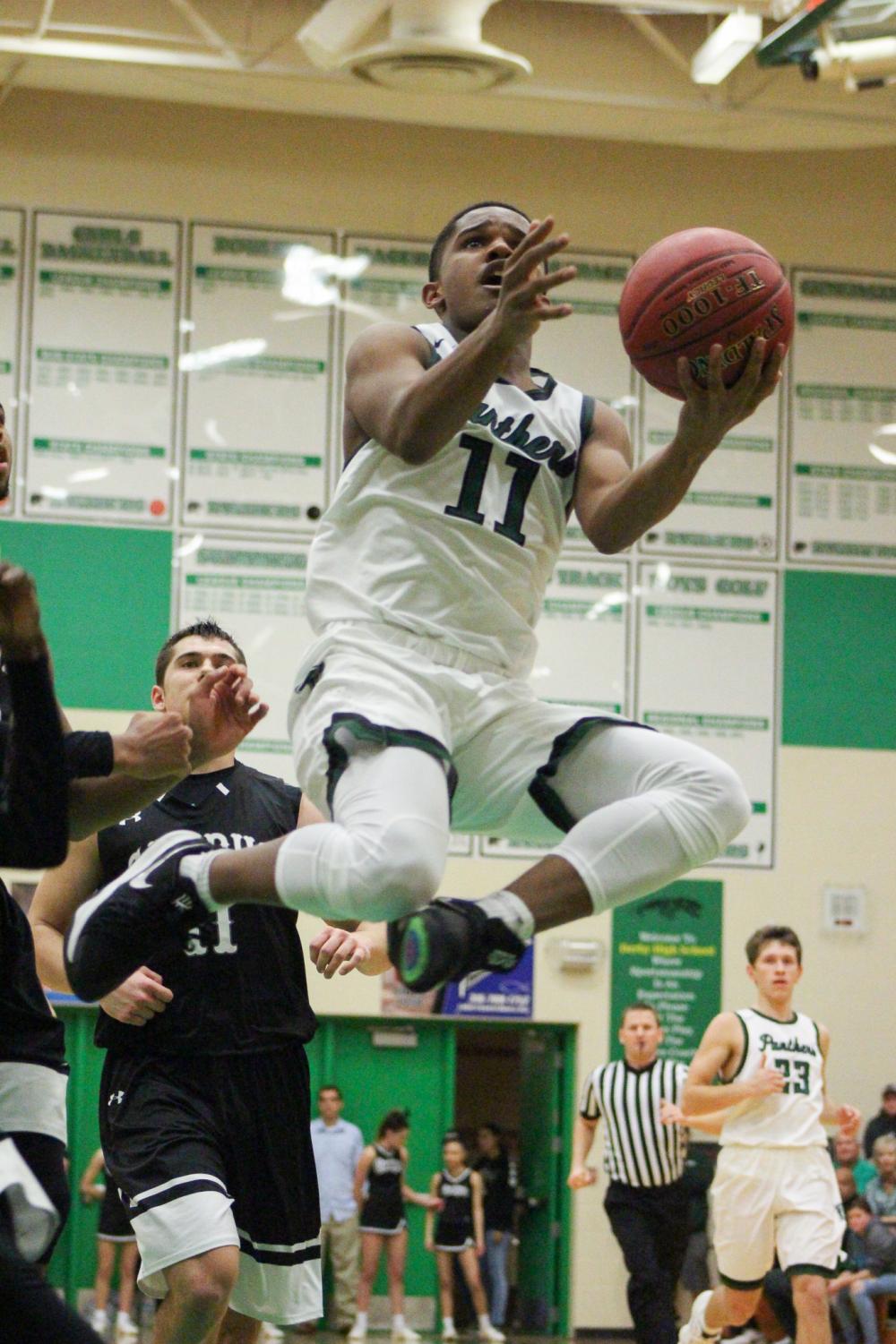 1%2F8+Boys+basketball+rivalry+game+vs.+Campus+photo+gallery+by+Regina+Waugh