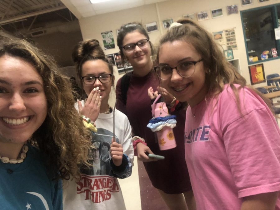 Freshman Makenzie Sarabia, freshman Haley Mccomb and junior Katie Spaulding dress as VSCO girls. Complete with a metal straw and Hydroflask.