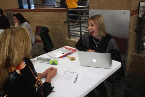 Spanish teacher Joy Sutherland talks to a parent during fall conferences on Oct. 21.