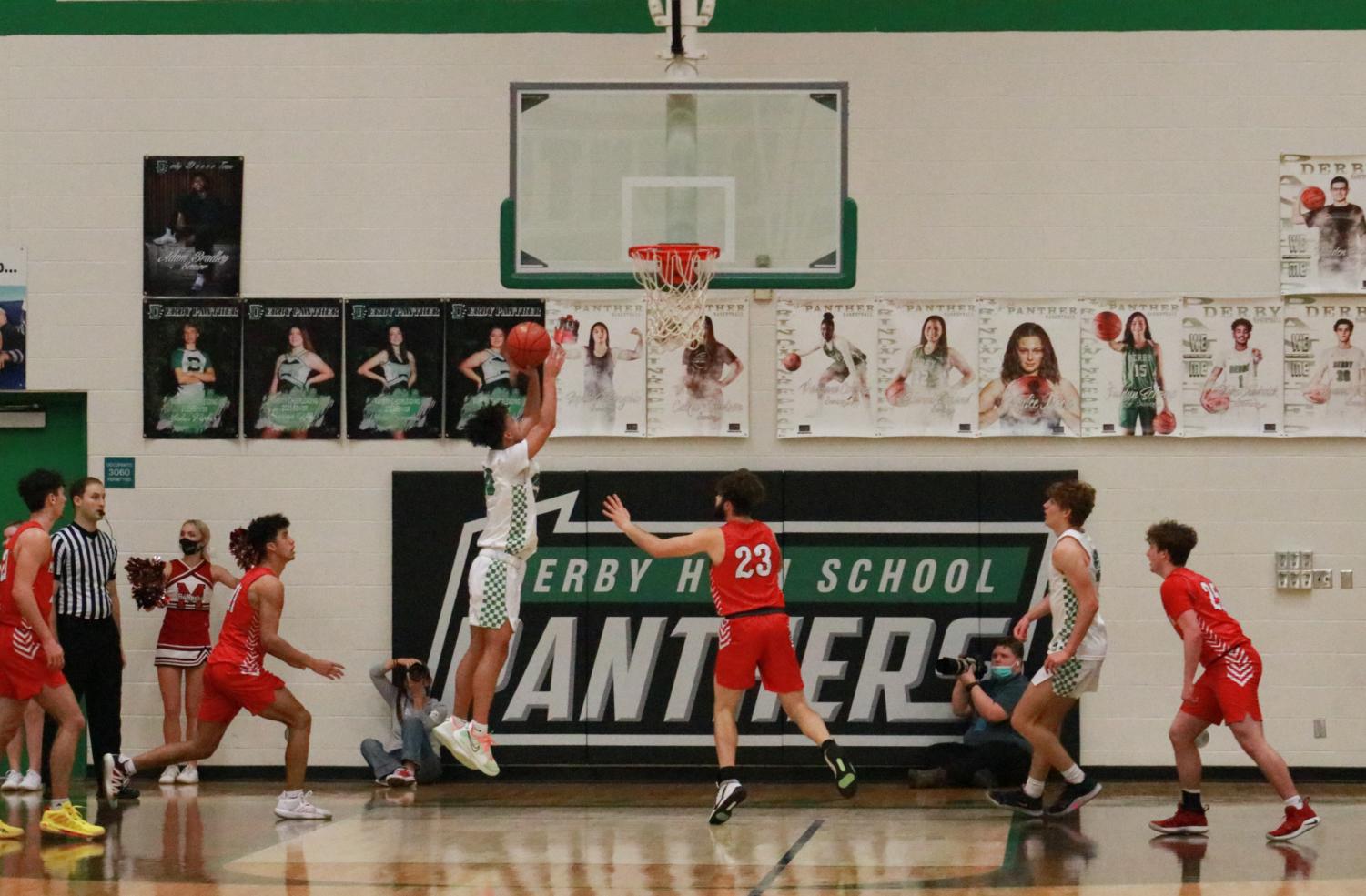 Boys+Varsity+basketball+at+home+against+McPherson+%28photos+by+Hailey+Jeffery%29