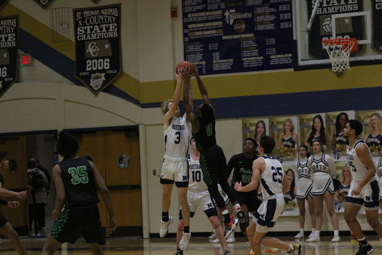 Jan. 8 Boys and Girls Basketball v. Blue Valley North (Photos by Jake Tracy)