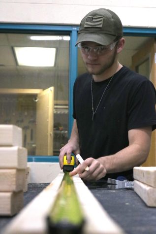 Woodshop works on playhouses (Photos by Haley Waughtal)