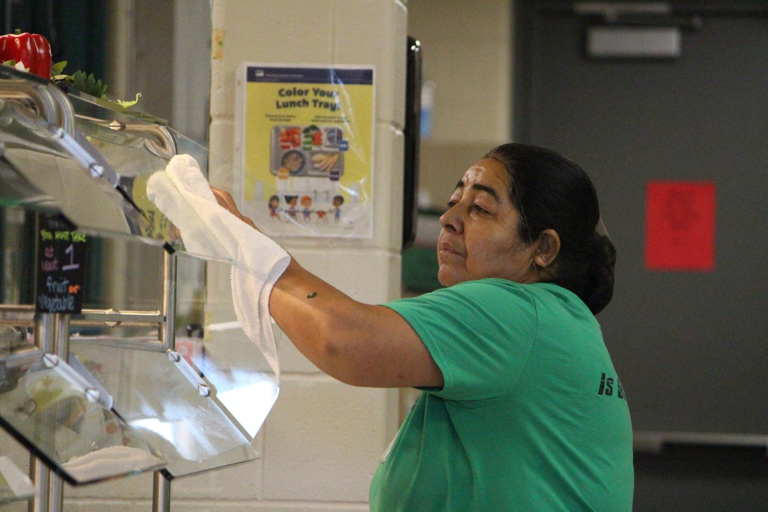 Janitors and lunch ladies cleaning up after lunch (Photos by Laurisa Rooney)