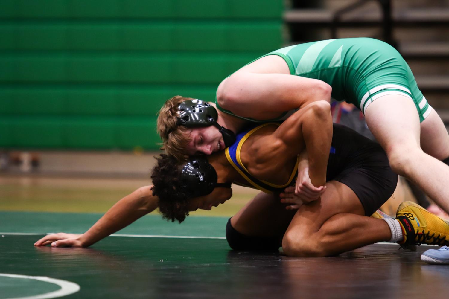 Varsity+wrestling+meet+at+home+%28Photos+by+Reese+Cowden%29