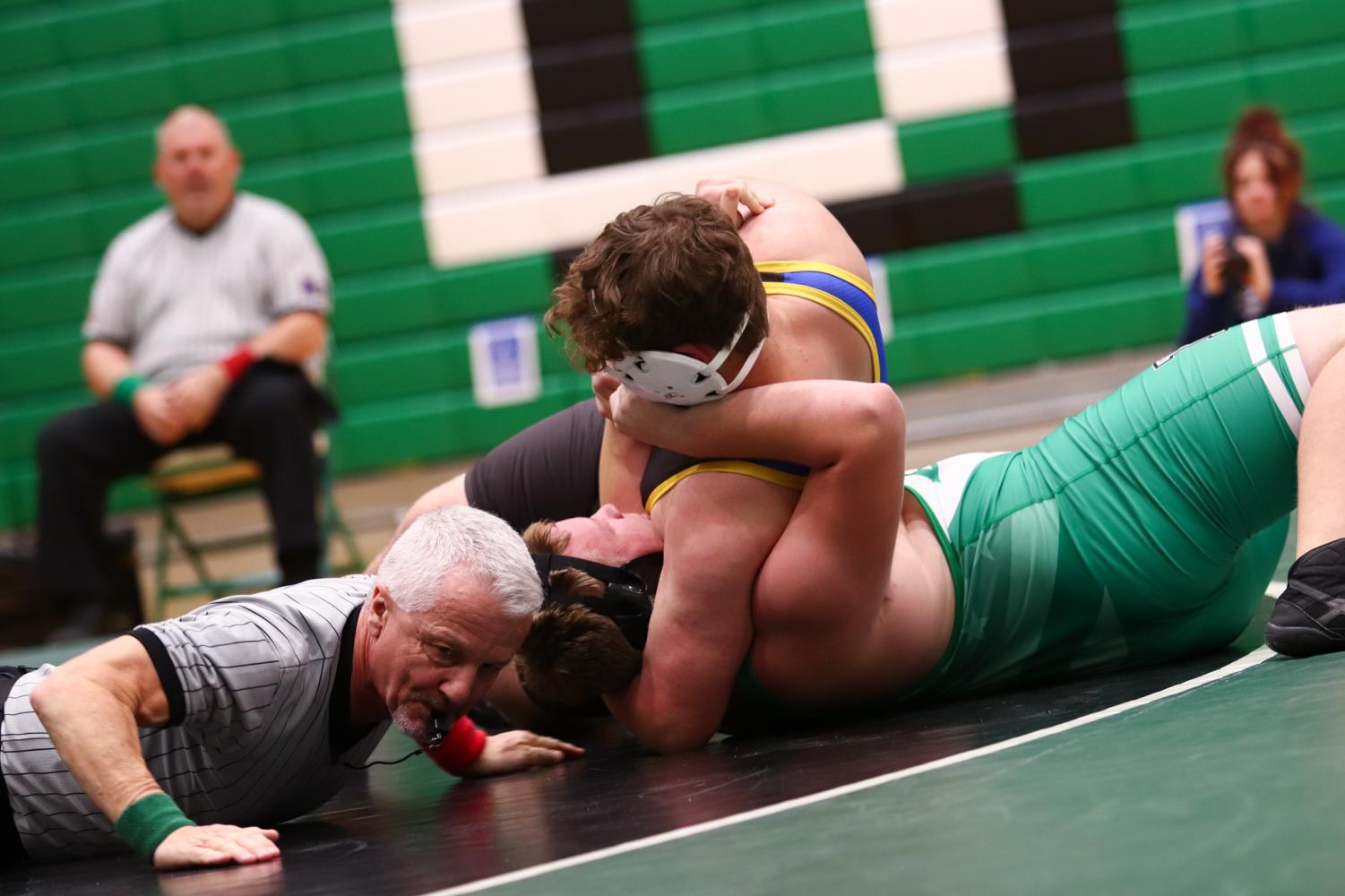 Varsity+wrestling+meet+at+home+%28Photos+by+Reese+Cowden%29