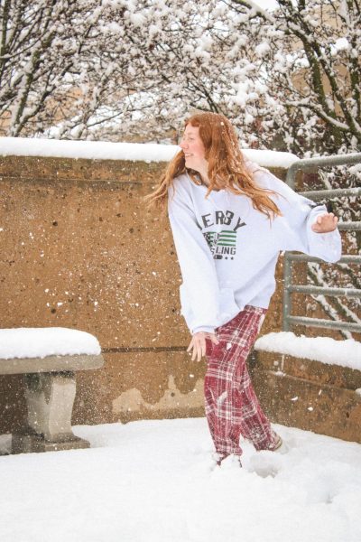 Students playing in the snow (Photos by Mikah Herzberg)