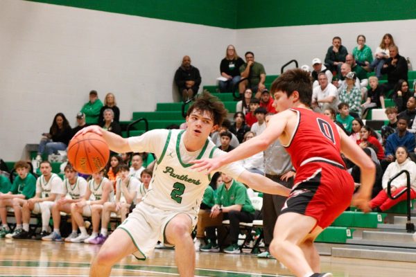 Boys basketball vs. Maize (Photos by Laurisa Rooney)