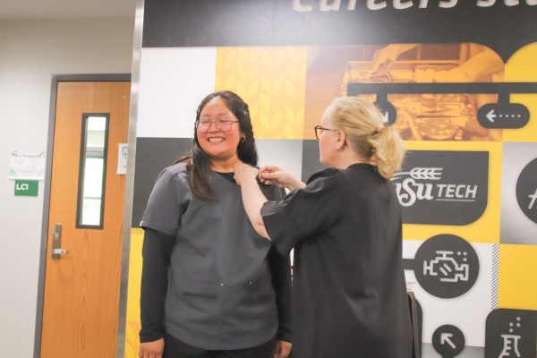 Navigation to Story: CNA pinning (Photos by Mikah Herzberg)