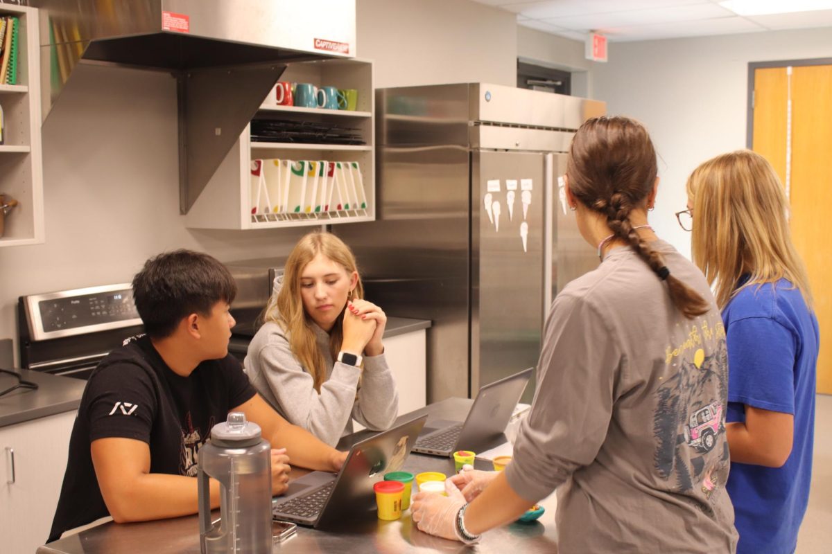 Students create play-doh projects in culinary class.