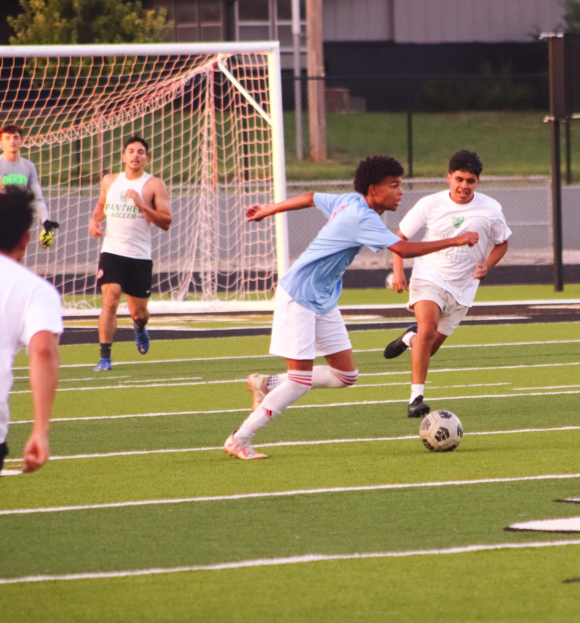 Boys soccer vs. Alumni (Photos by Ava Mbawuike)