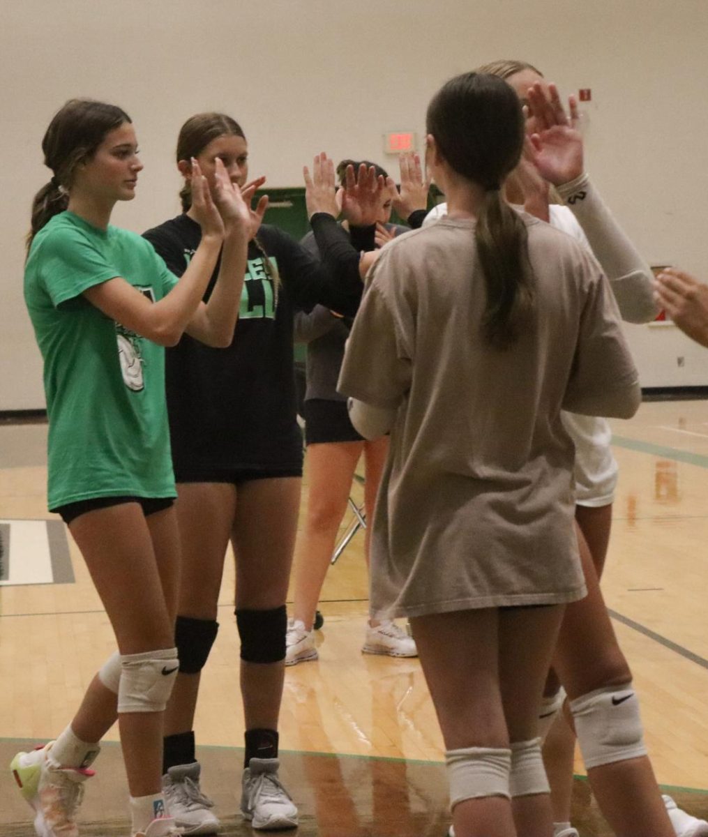 Teammates support one another after a great practice. 