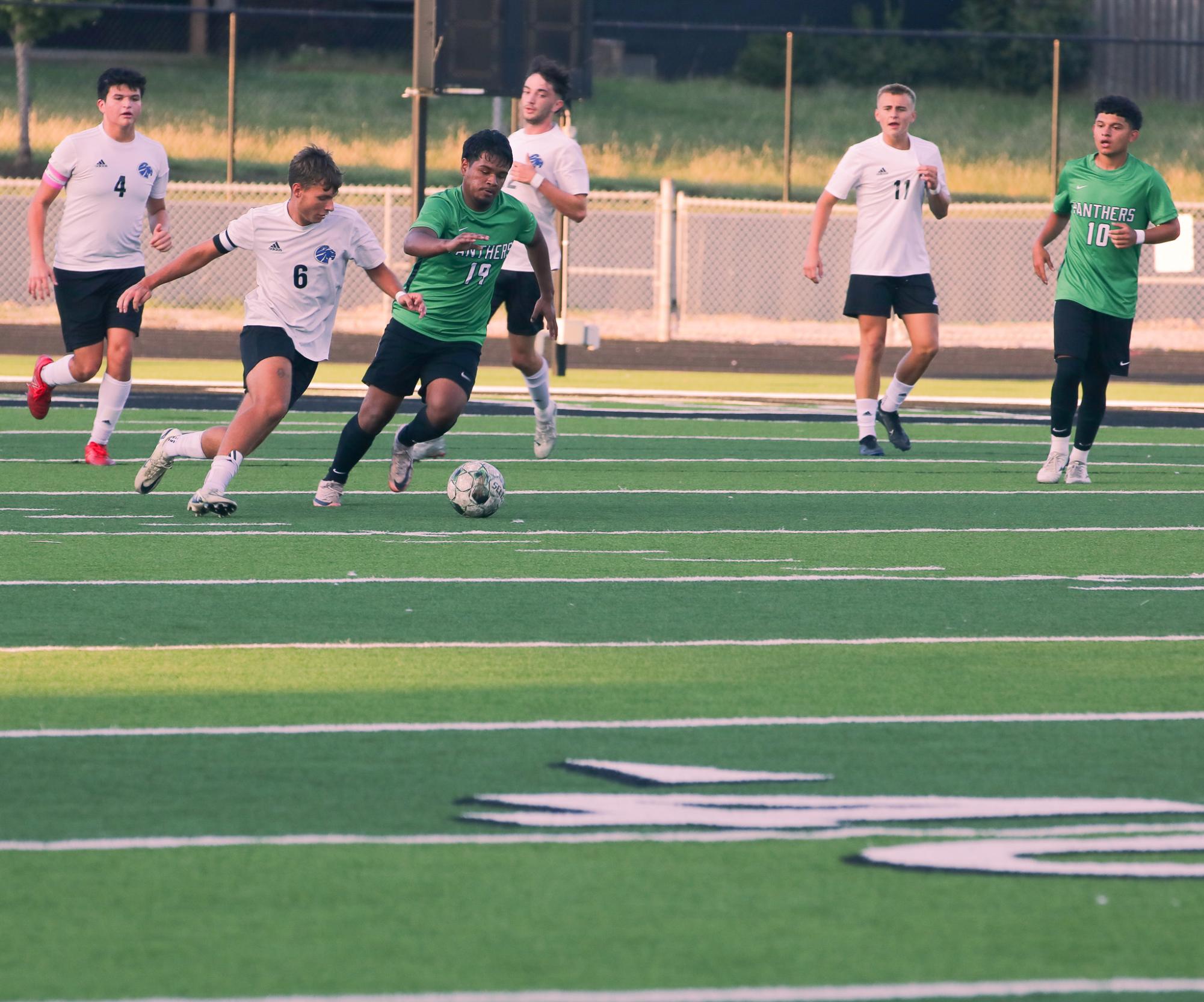 Boys varsity soccer vs. Goddard (Photos by Ava Mbawuike)