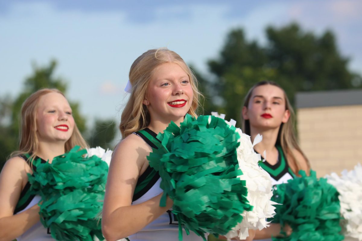 Lexi Schott cheers at the tailgate.