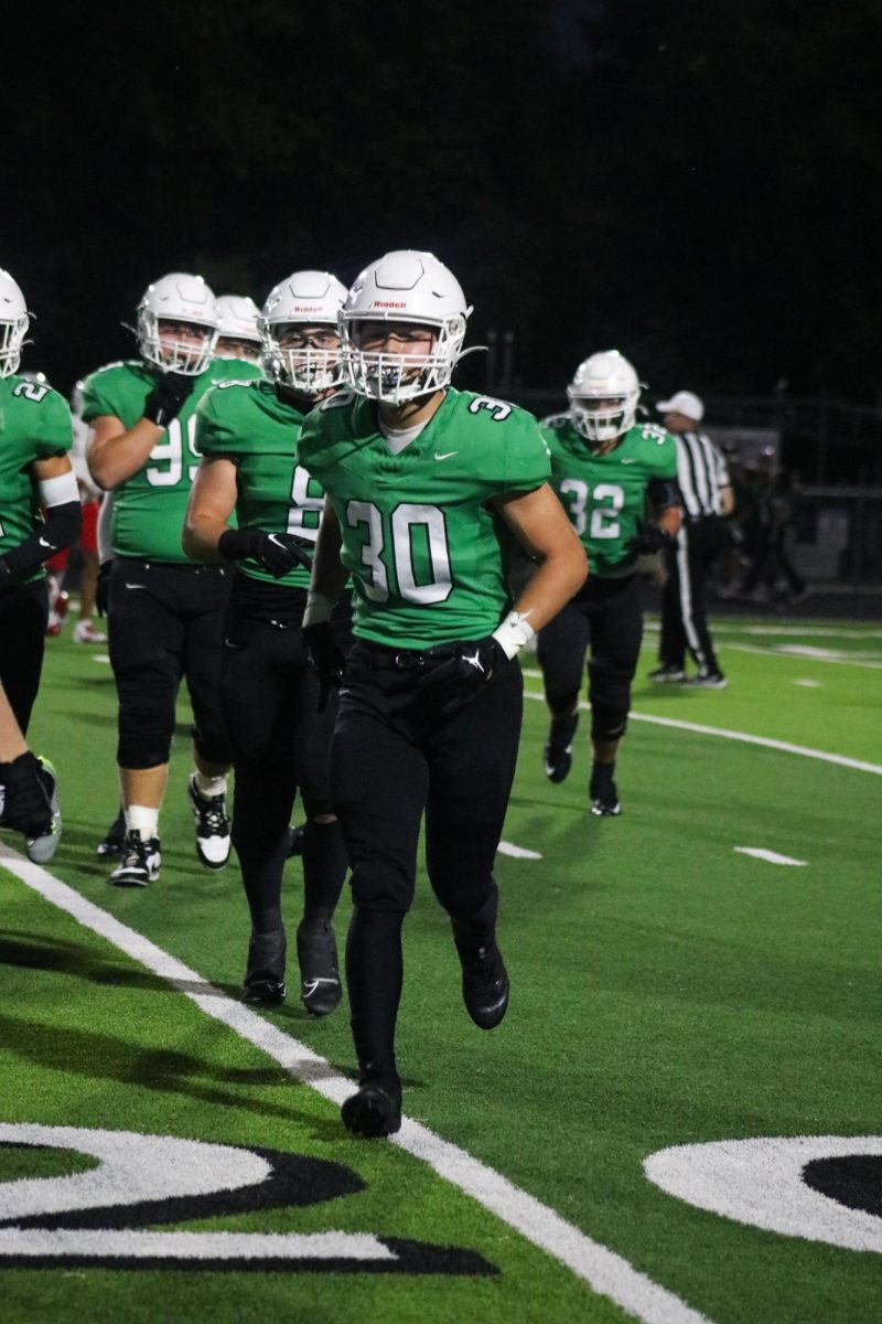 Players jog off field. 