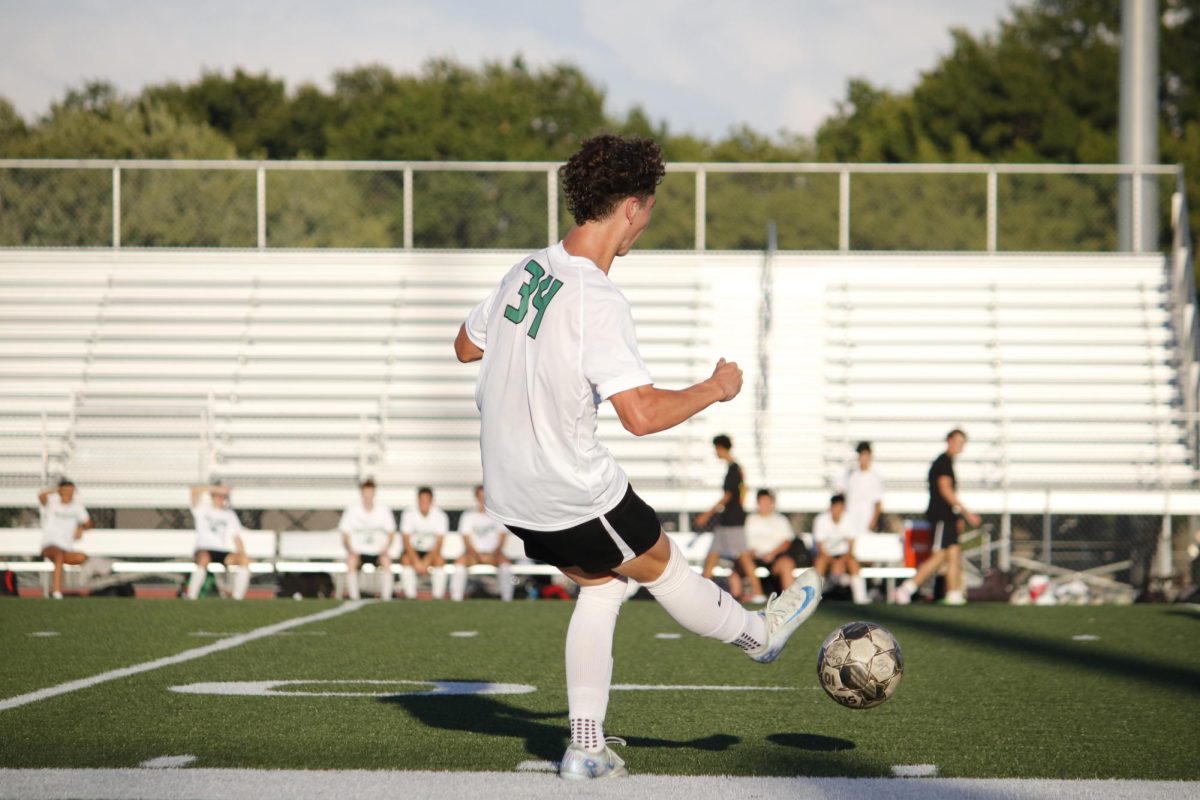 Student gets extra practice for game during halftime.