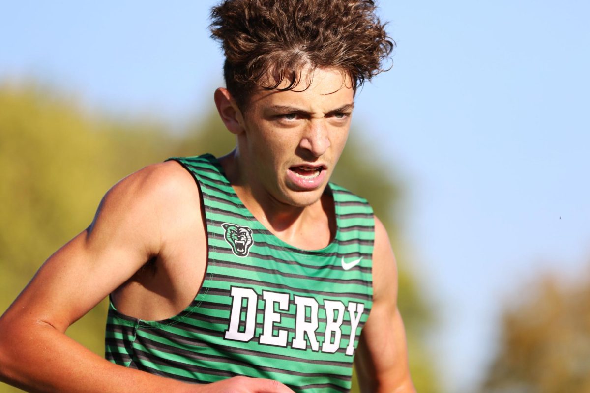 Runners compete in the cross-country race at Newton Centennial Park. The varsity boys placed third overall with 106 points, while the varsity girls placed sixth with 131 points.