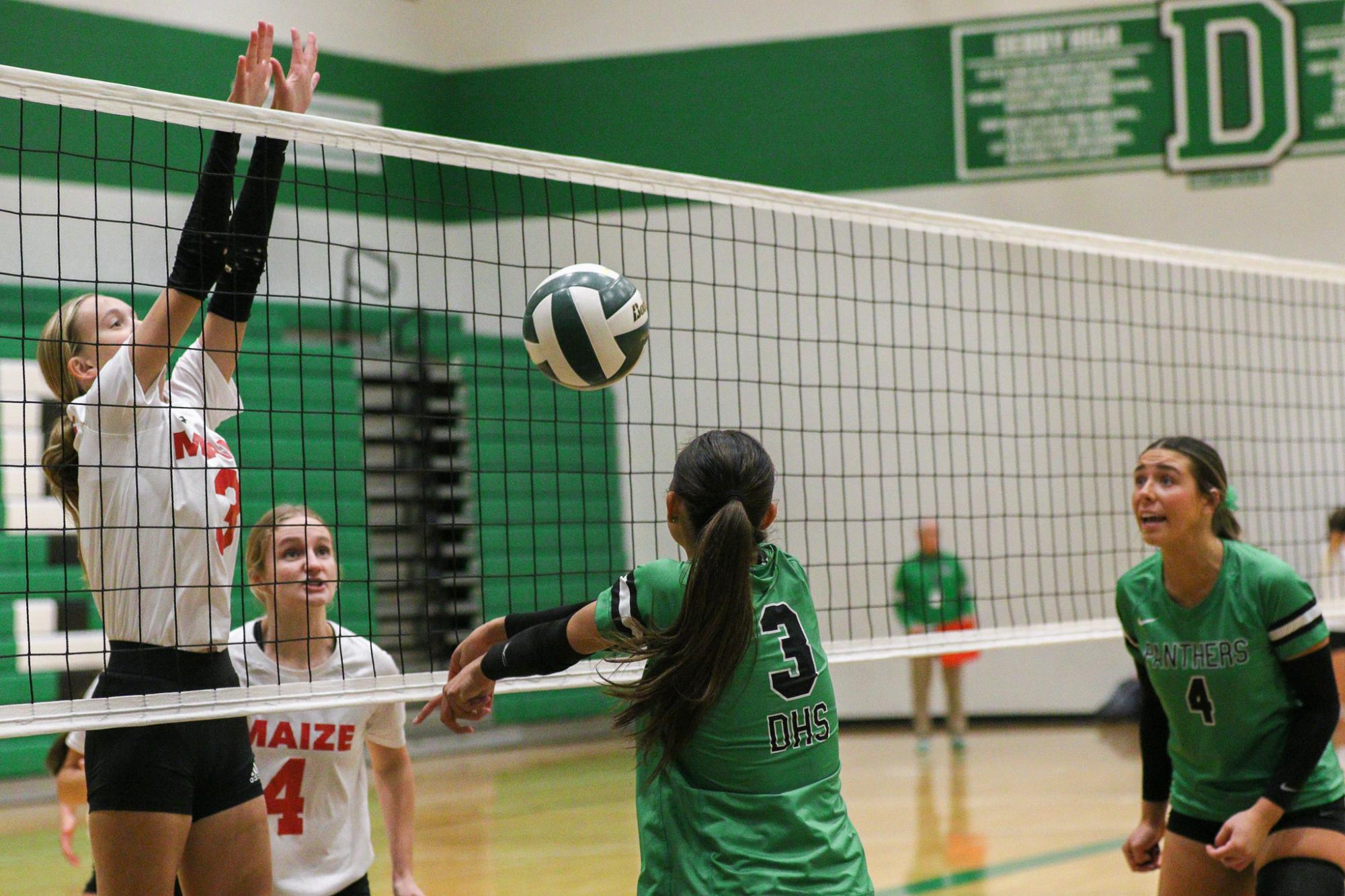 Varsity Volleyball vs. Maize (Photos by Liberty Smith)