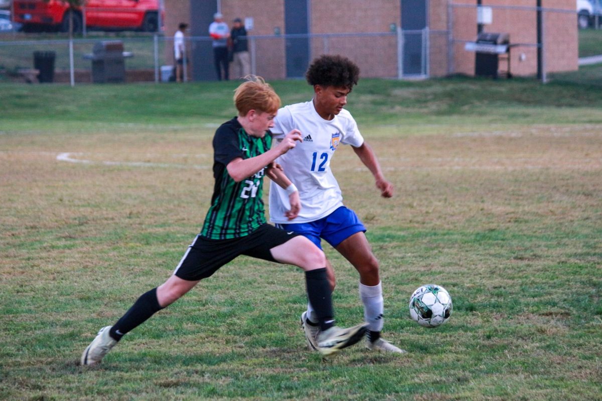 Player tries to steal the ball from opponent. 