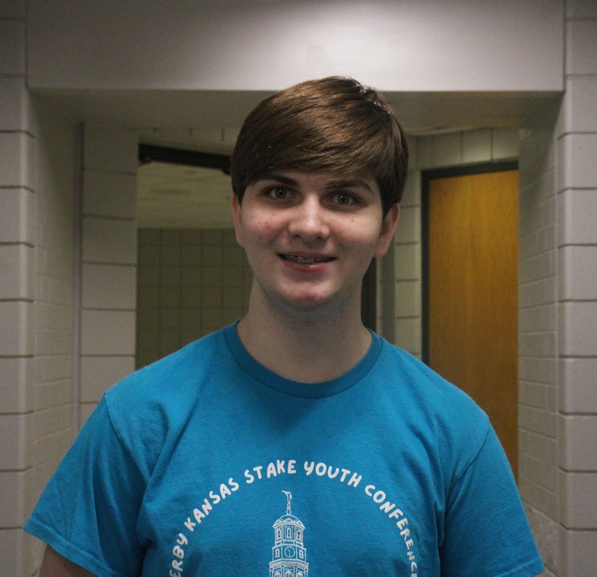 Senior Peter Harrison describing the band concert.