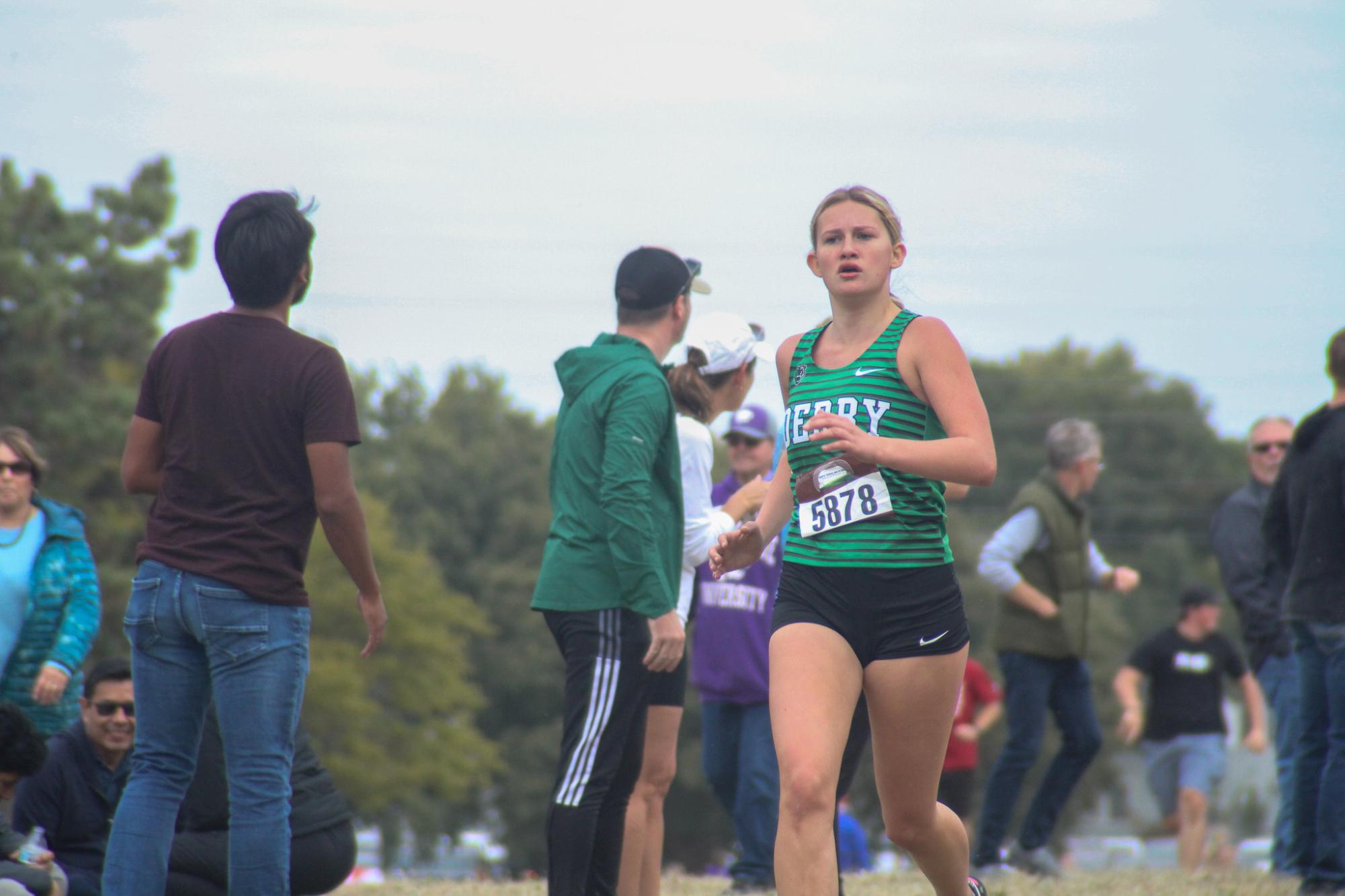 Sophomore, Brittyn Williams runs for finish line.