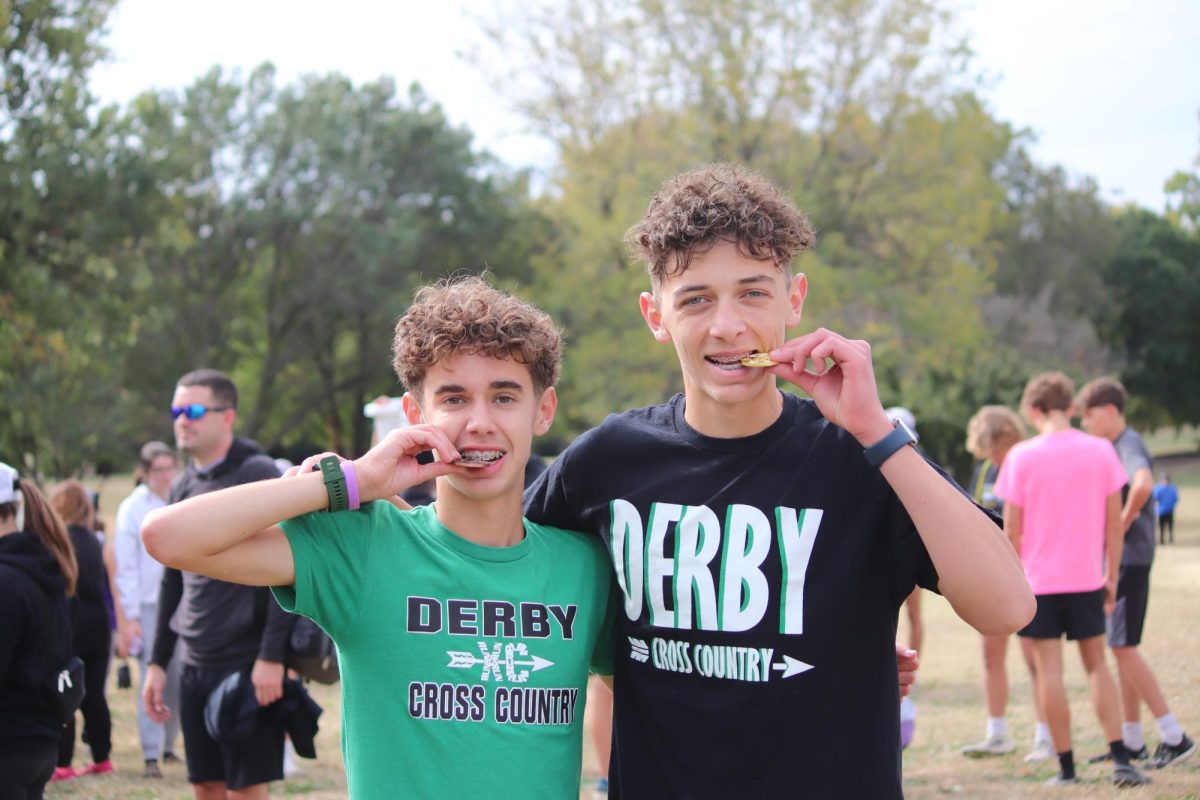 Runners posing with their medals.