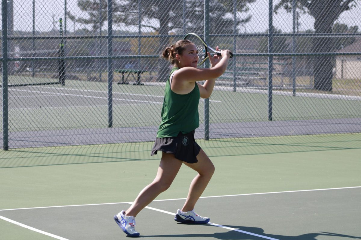 Sophomore Emma Flaharty prepares to hit the ball. 