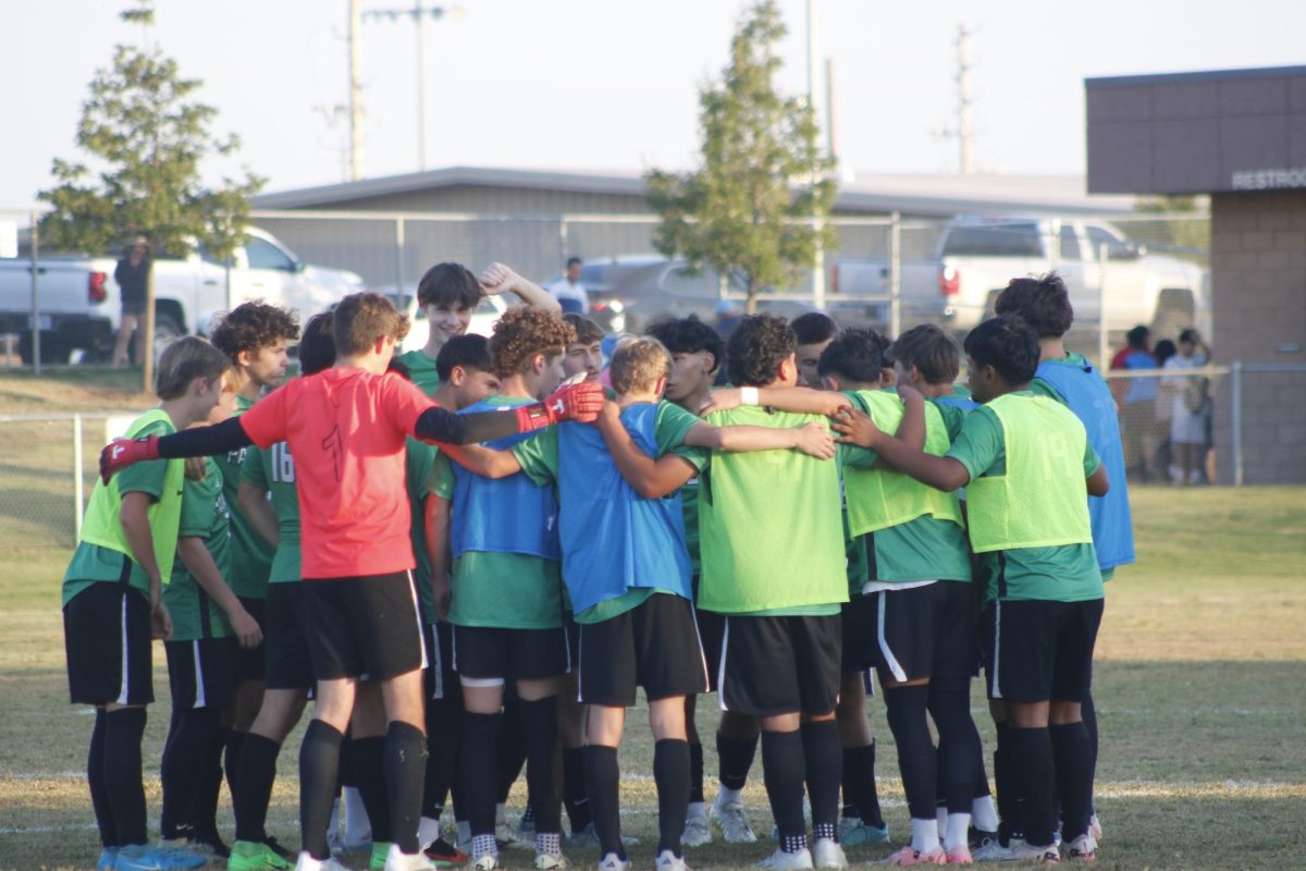 Players huddle together before game.