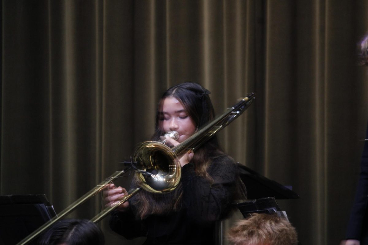 Trombone player performs a solo.