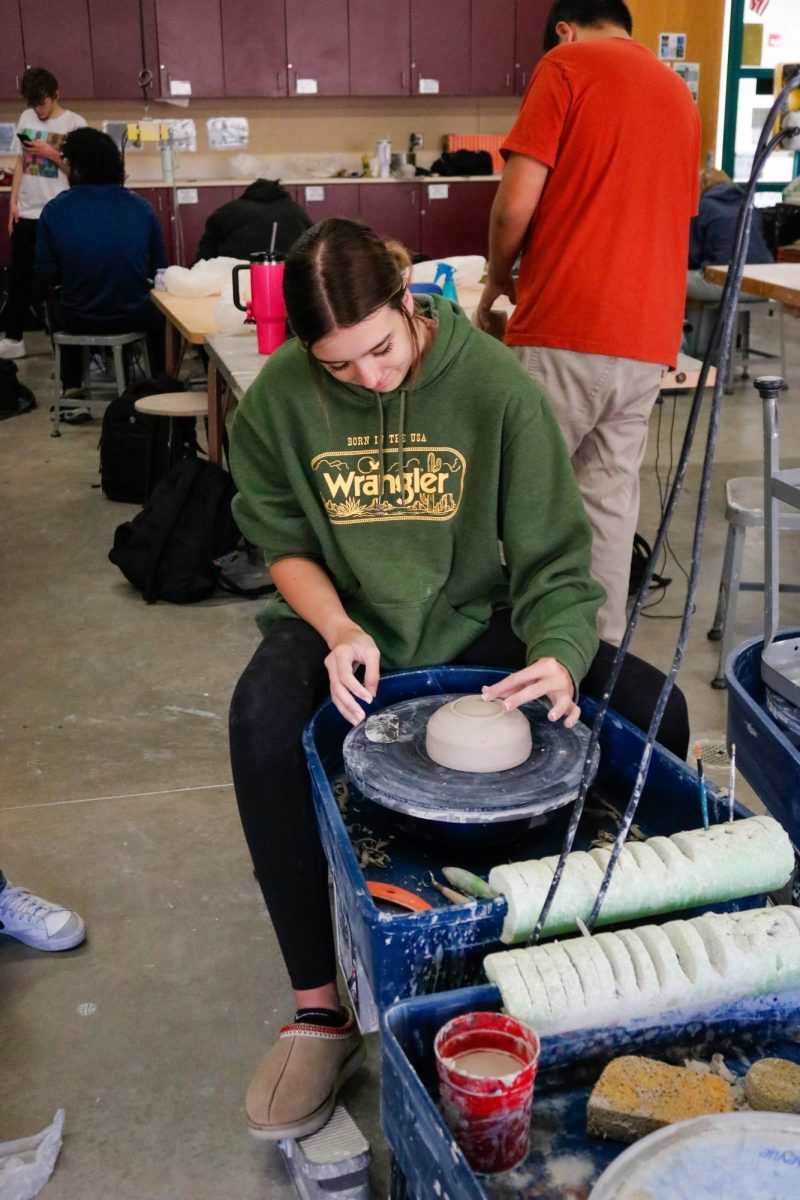 Junior Ruby Pike puts some finishing touches on her project. 