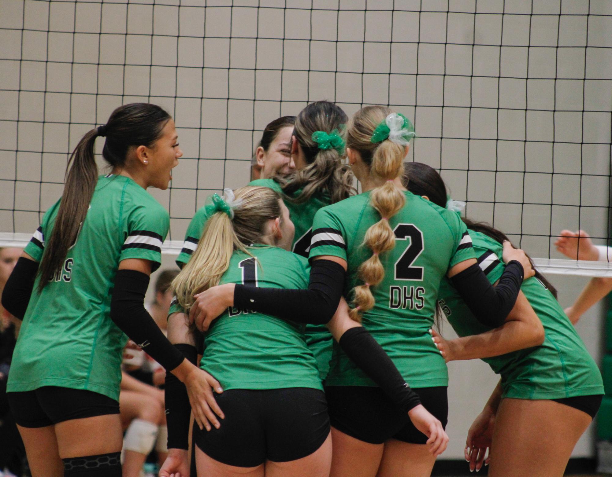 Varsity Volleyball vs. Maize (Photos by Betsy Ordinan)