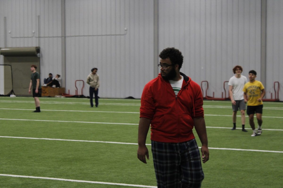 Junior Trenton Daniels waits for next game to start 