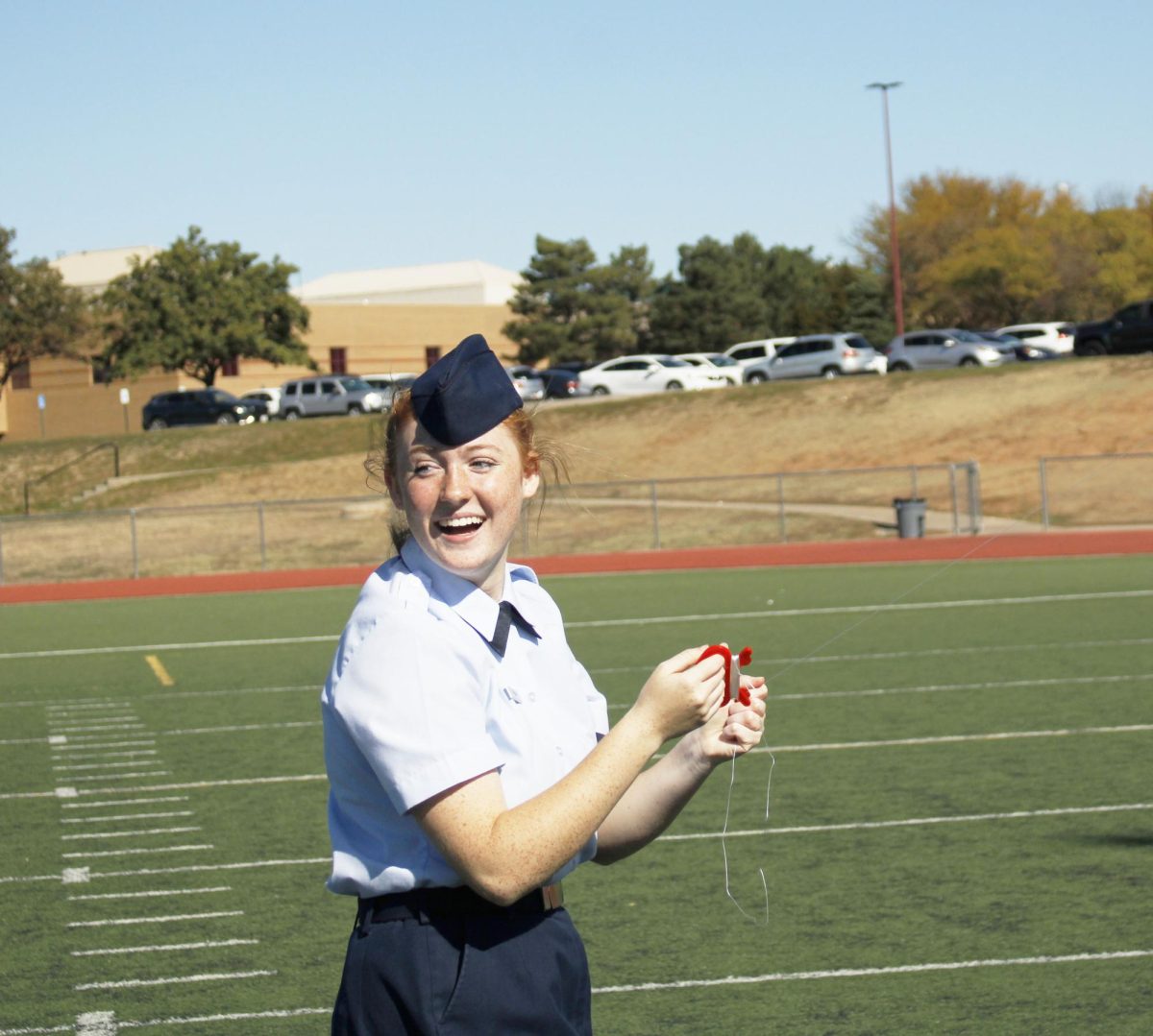 Sophomore Katie Pinkham smiles about her kite.