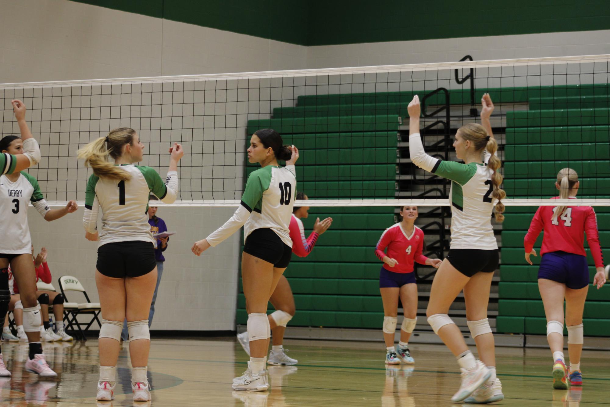 Varsity Volleyball (Photos by, Emily Crowell)