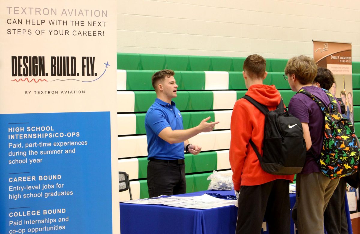 Juniors and seniors interact with college and career speakers during the Career Fair, exploring future opportunities.