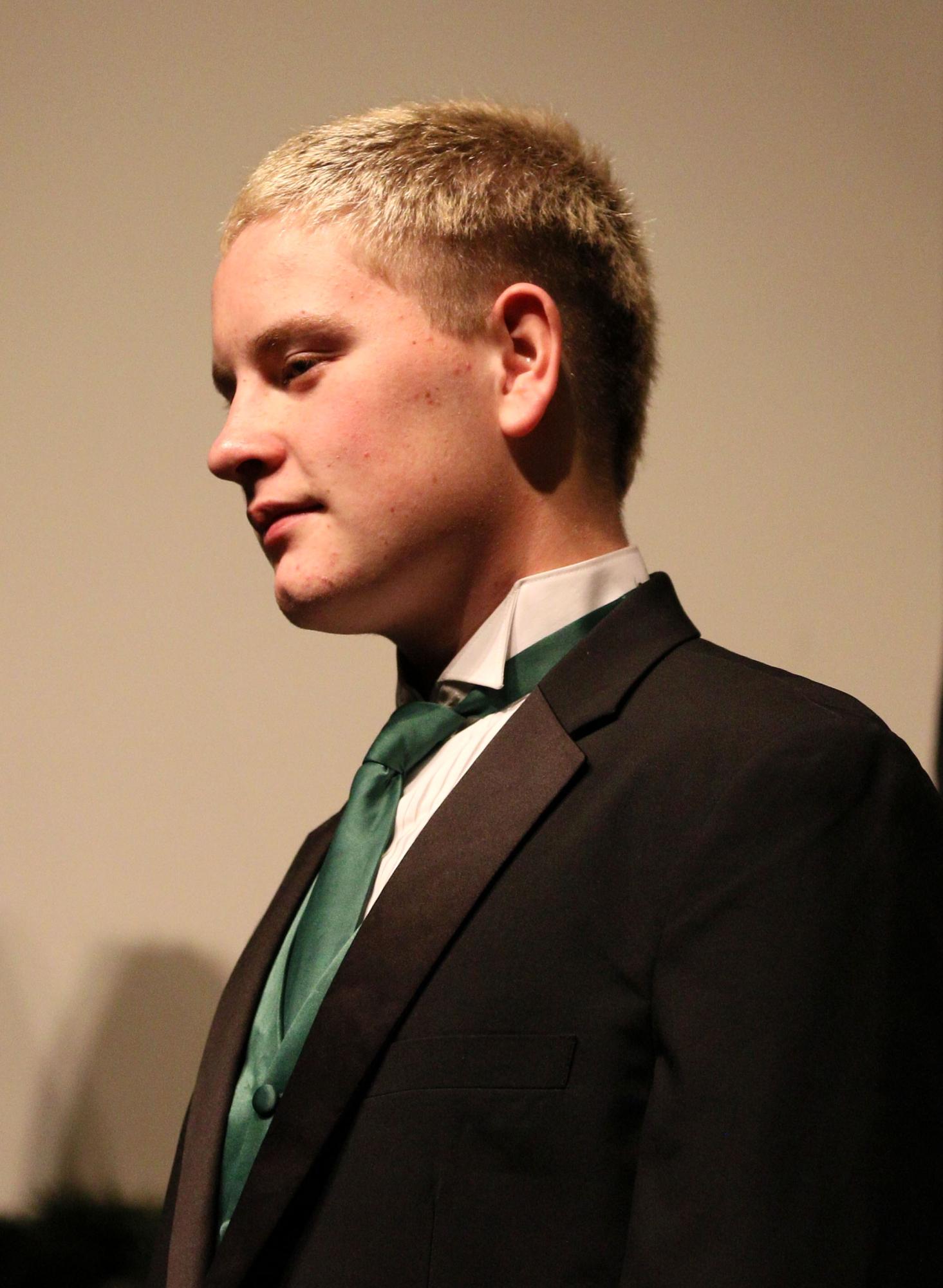 Junior Henry Blagg performs during the winter choir concert on Dec. 19.
