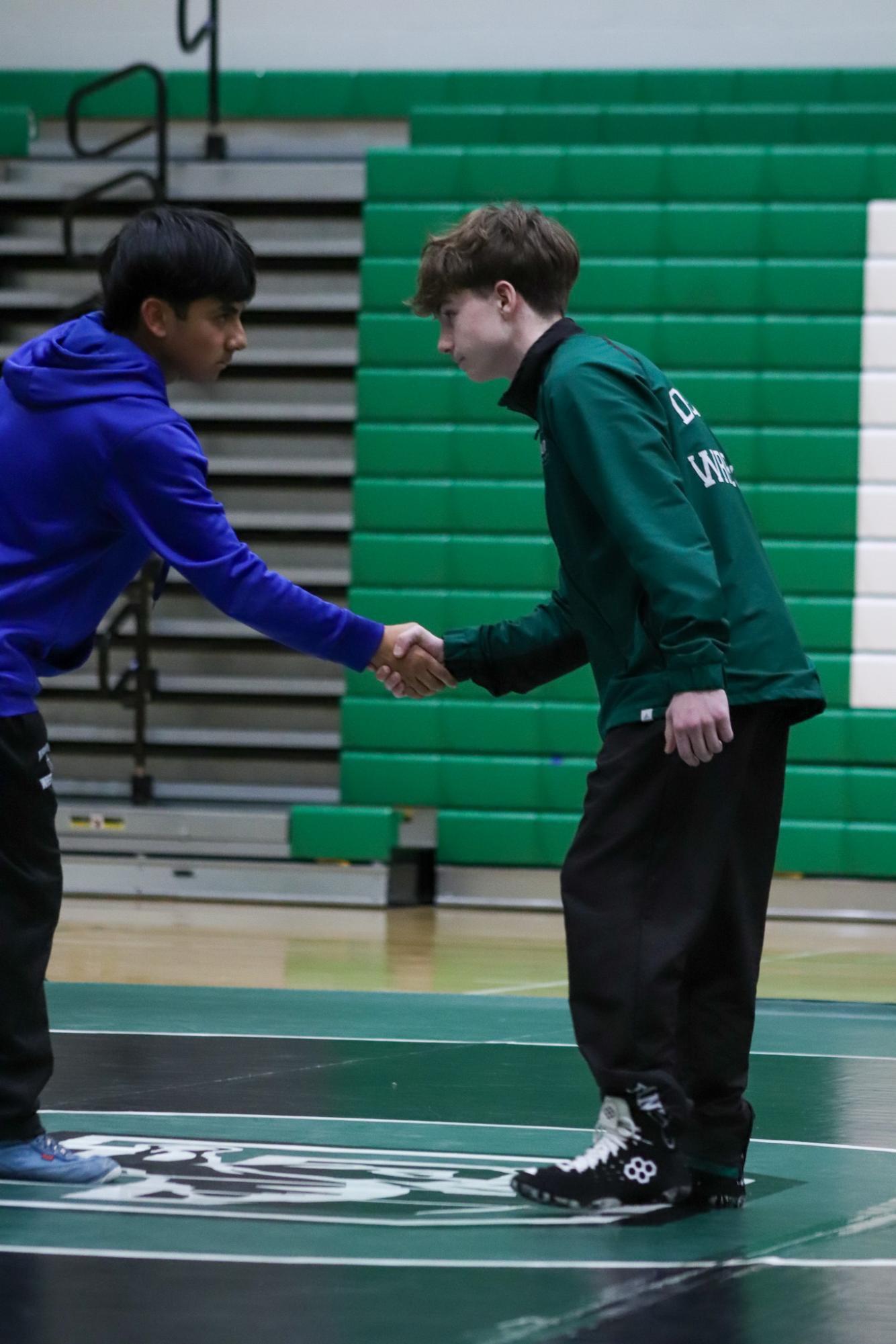 Girls and boys varsity wrestling vs. girls and boys Kapaun (Photos Delainey Stephenson)