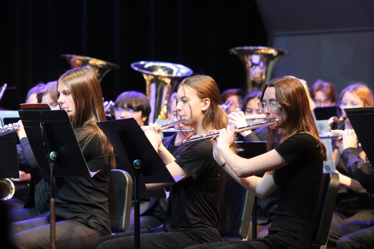 Flute players perform