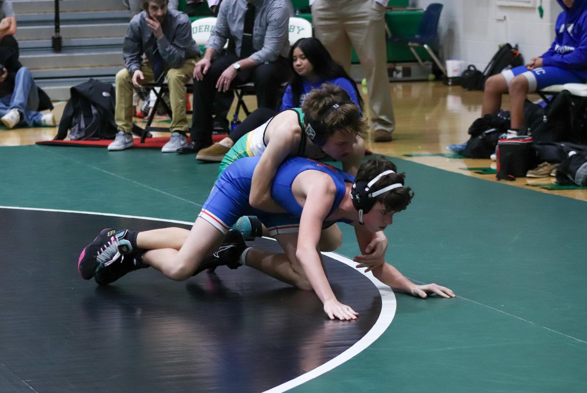 Girls and boys varsity wrestling vs. girls and boys Kapaun (Photos Delainey Stephenson)