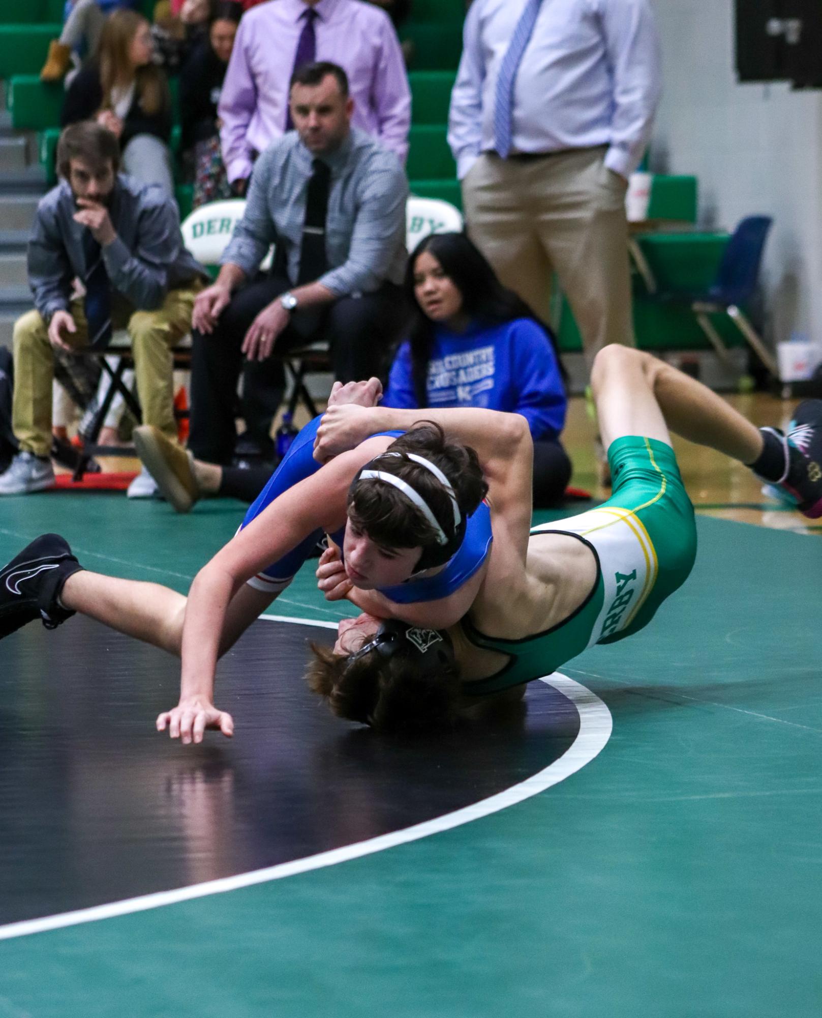 Girls and boys varsity wrestling vs. girls and boys Kapaun (Photos Delainey Stephenson)