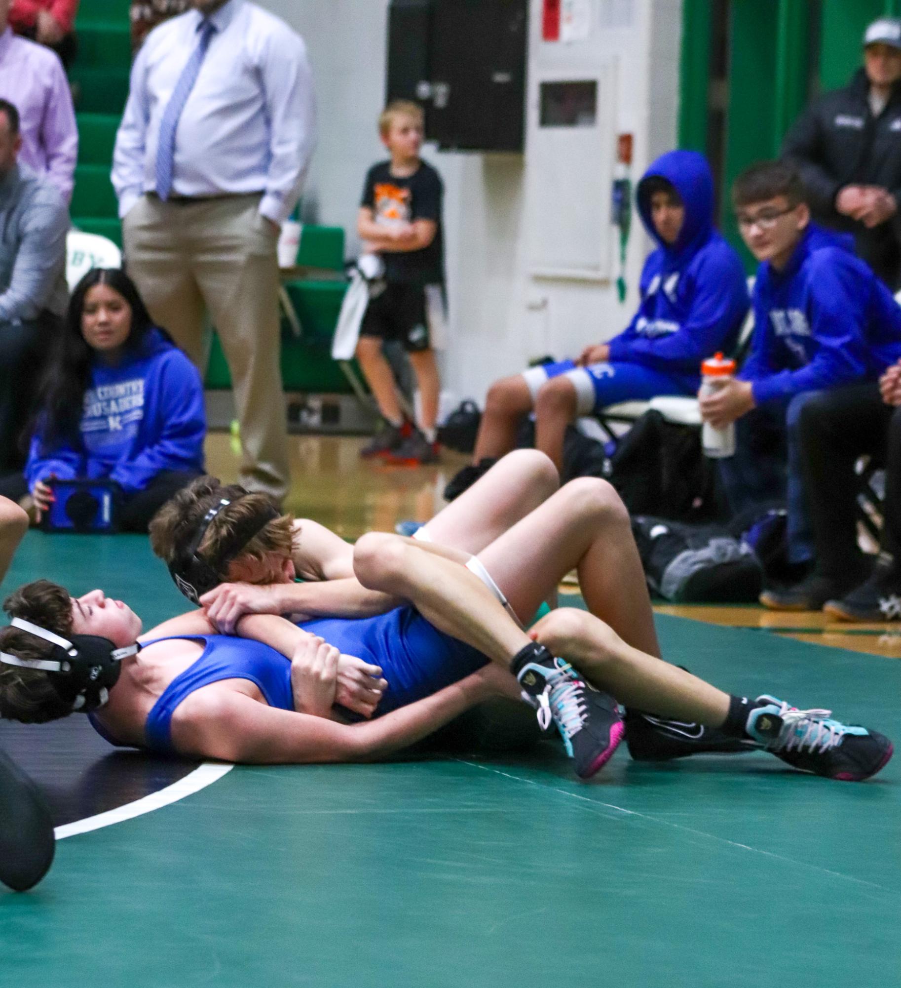 Girls and boys varsity wrestling vs. girls and boys Kapaun (Photos Delainey Stephenson)