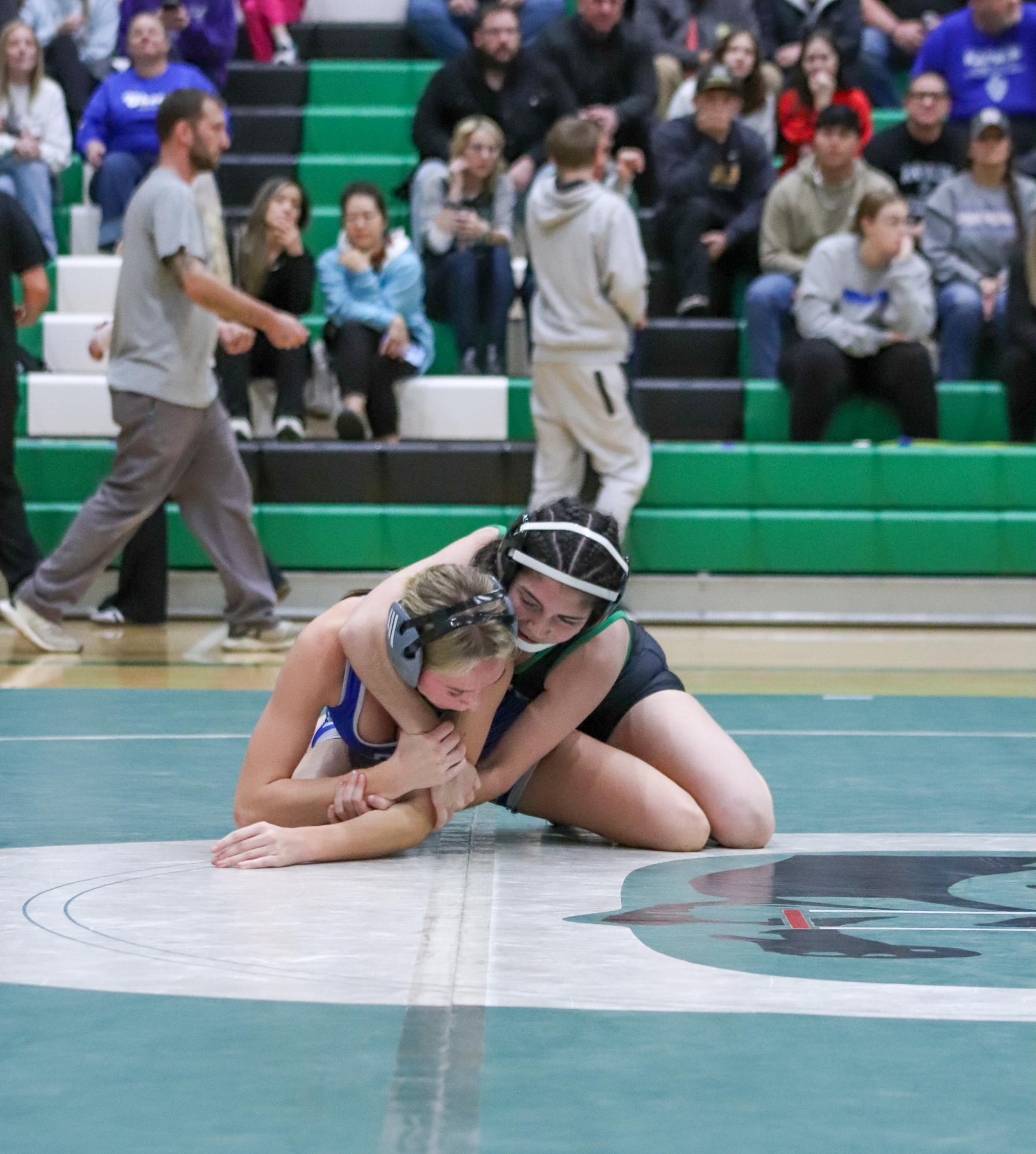 Girls and boys varsity wrestling vs. girls and boys Kapaun (Photos Delainey Stephenson)