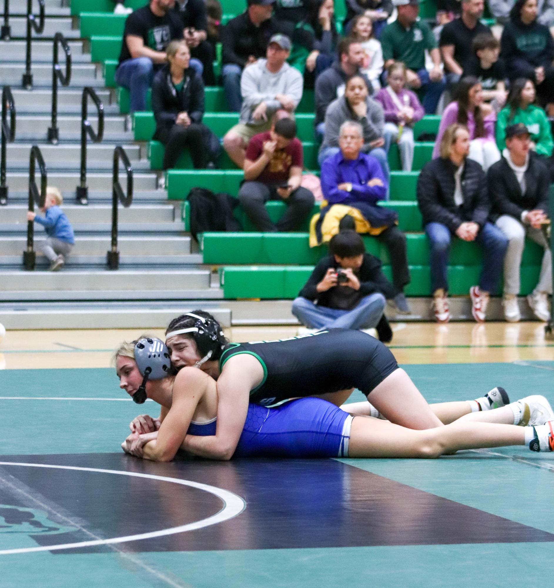 Girls and boys varsity wrestling vs. girls and boys Kapaun (Photos Delainey Stephenson)